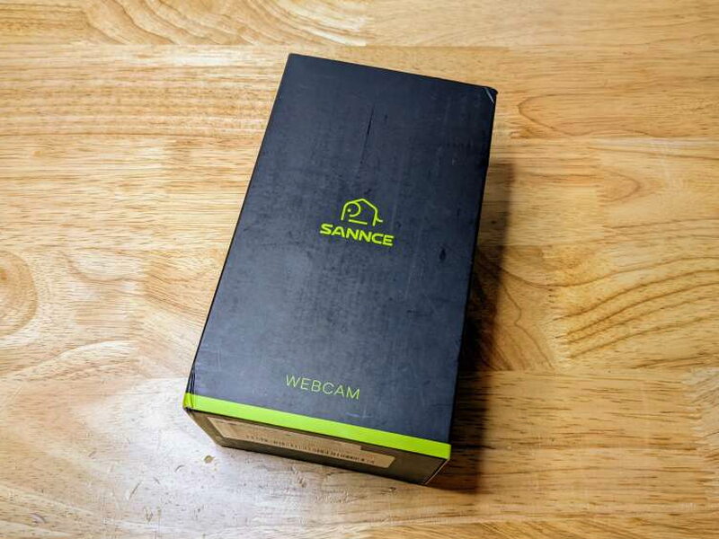 The outer SANNCE box presents the webcam in a polished retail package.