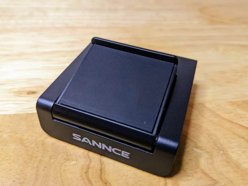 The magnetic base is compact and matches the width of the webcam.