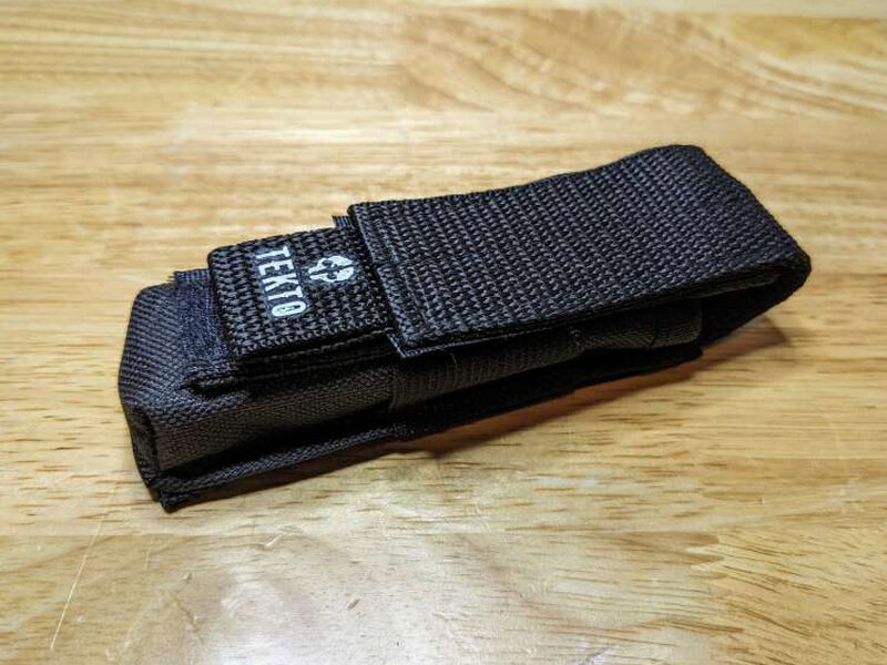 The included nylon carry case closes with a Velcro flap.