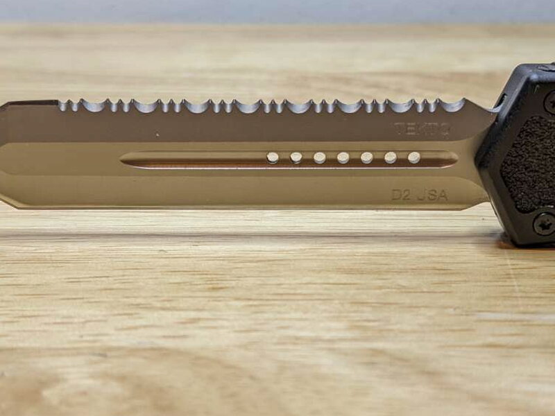 The blade’s channel and small cutouts run down the center.