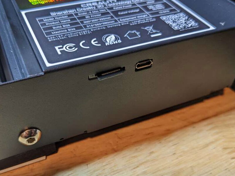 The MicroSD and Micro USB ports are located on the front of the printer base.