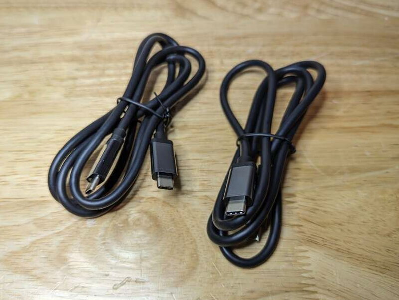 The box includes two USB-C to USB-C cables for the computer connections.