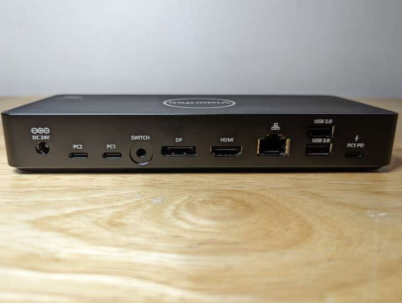 The rear panel carries the power, host computer, wired switch, display, Ethernet, USB-A, and USB-C PD connections.