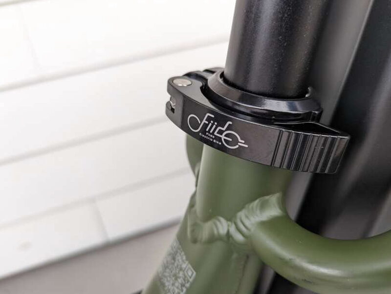 A close look at the Fiido branded clamp area and reinforced frame welds.