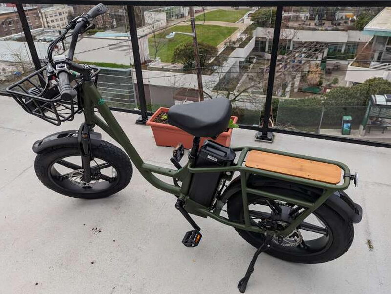 The T1 Pro parked after testing, showing its long utility frame and cargo setup.