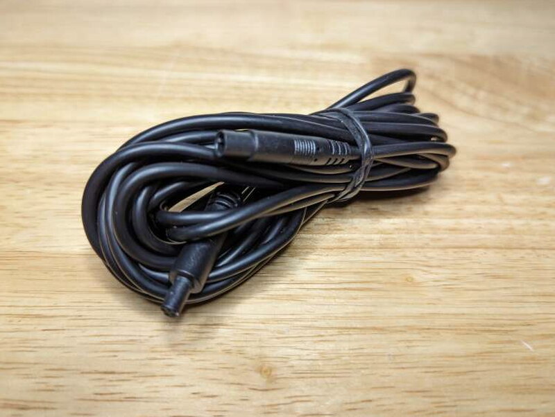 The rear camera extension cable is about fifteen feet long and uses matching barrel connectors.