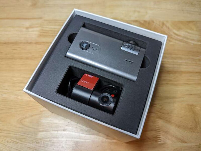 The front and rear cameras sit securely in the foam insert inside the retail box.