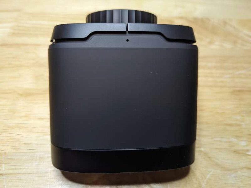 Up top, smooth rounded edges and a small port for the internal microphone.