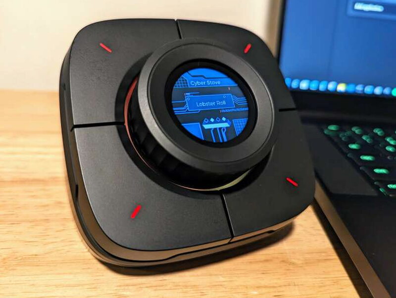 The one feature I’m completely lost on: Cyber Stove. Like most of the other Colo Play apps, there’s no documentation for it anywhere, and all it appears to do is show the names of various foods when you click the dial.