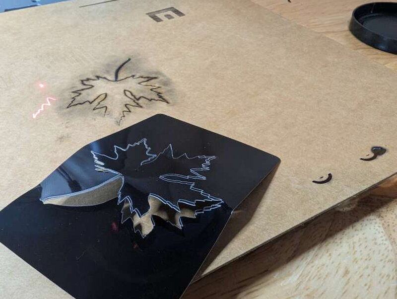 The finished engraving on aluminum, every line intact.