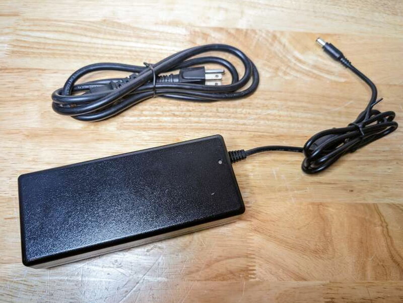 The power brick and cord, a fairly ordinary 12V DC setup.
