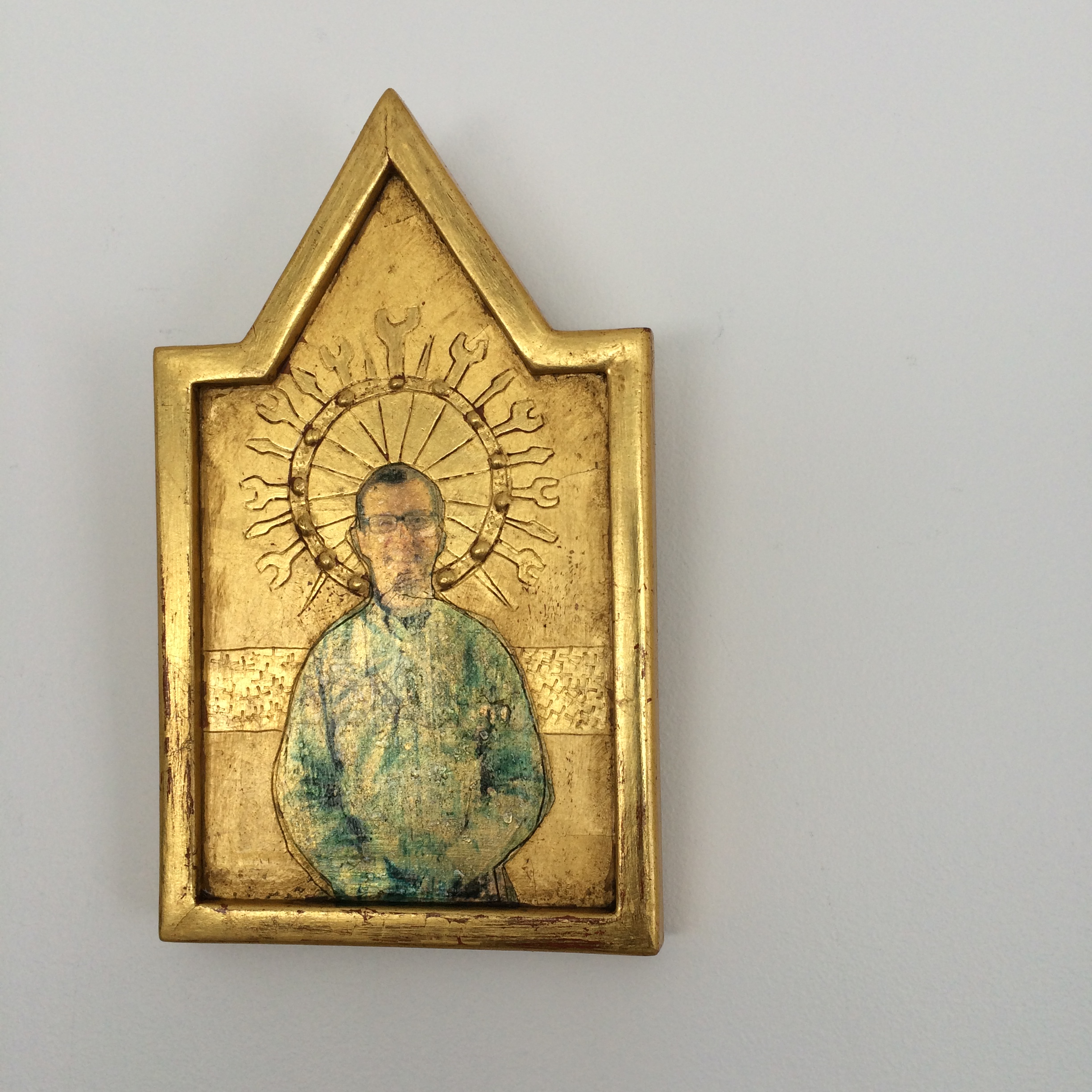 The Mechanic: 22 karat gold leaf on incised and embossed panel