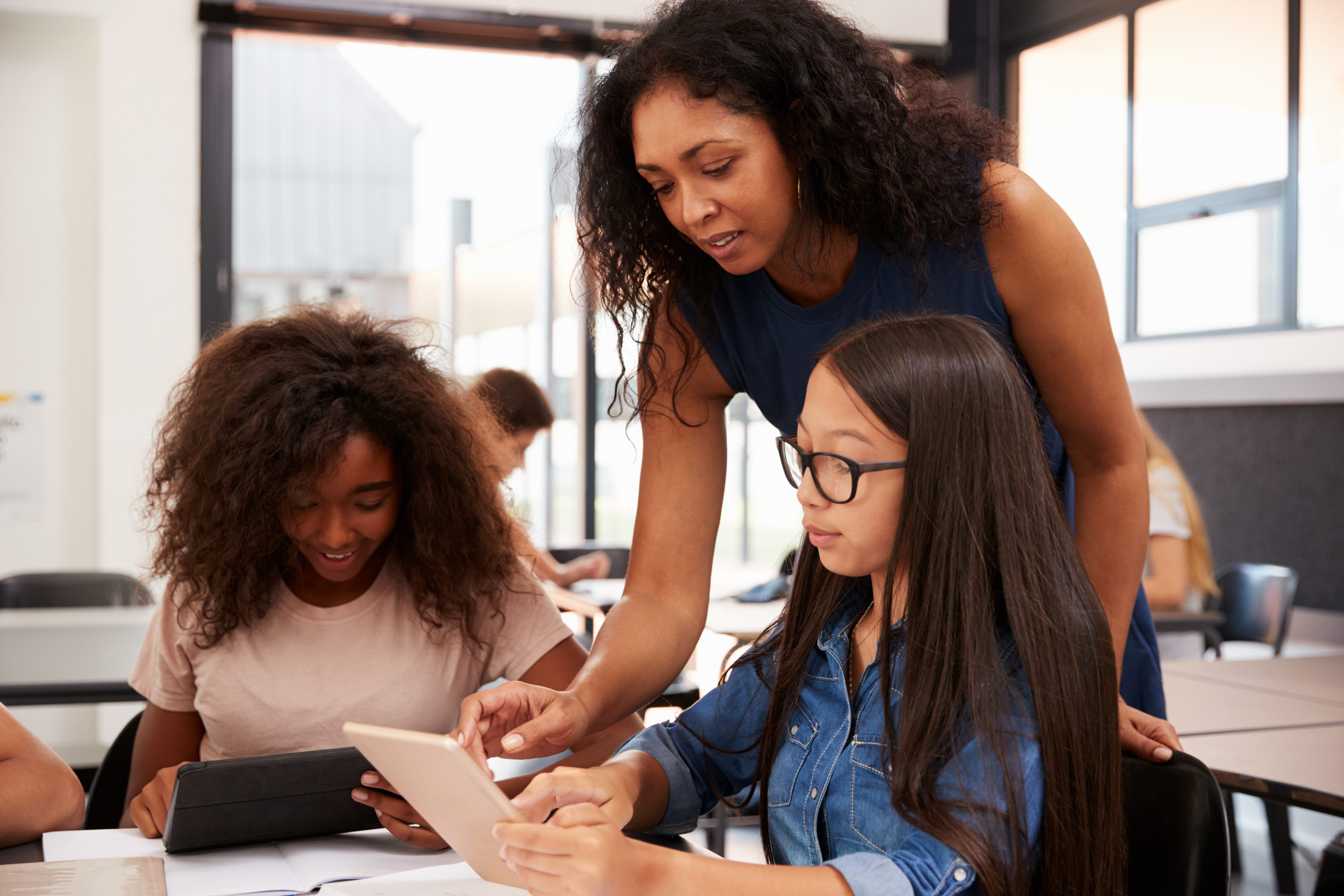 A teacher working with students