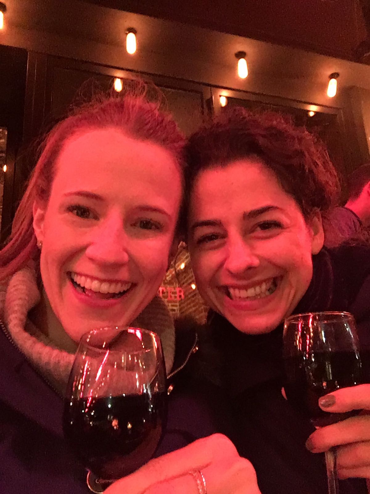 Molly and I eating our French Dreams on our first night in Paris. Midnight burgers, wine and profiteroles <3