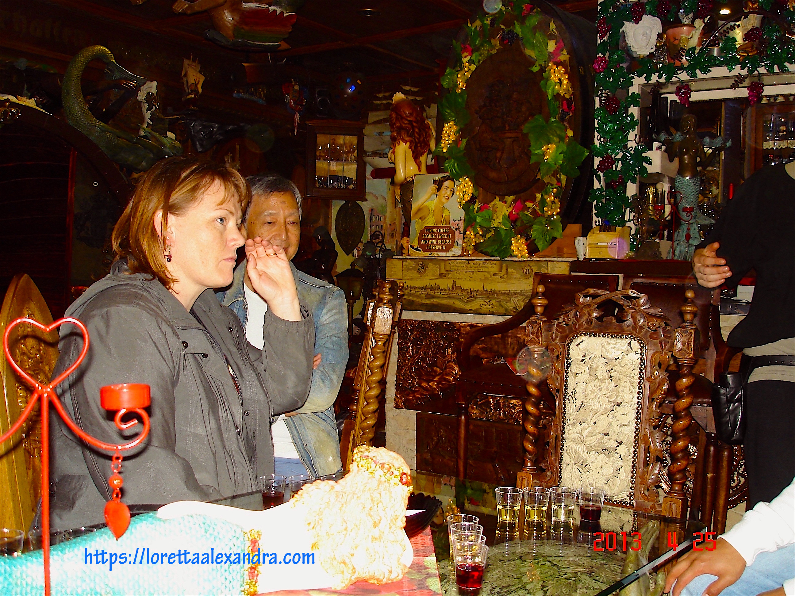 27. After lunch, several on the tour went next door for wine tasting.