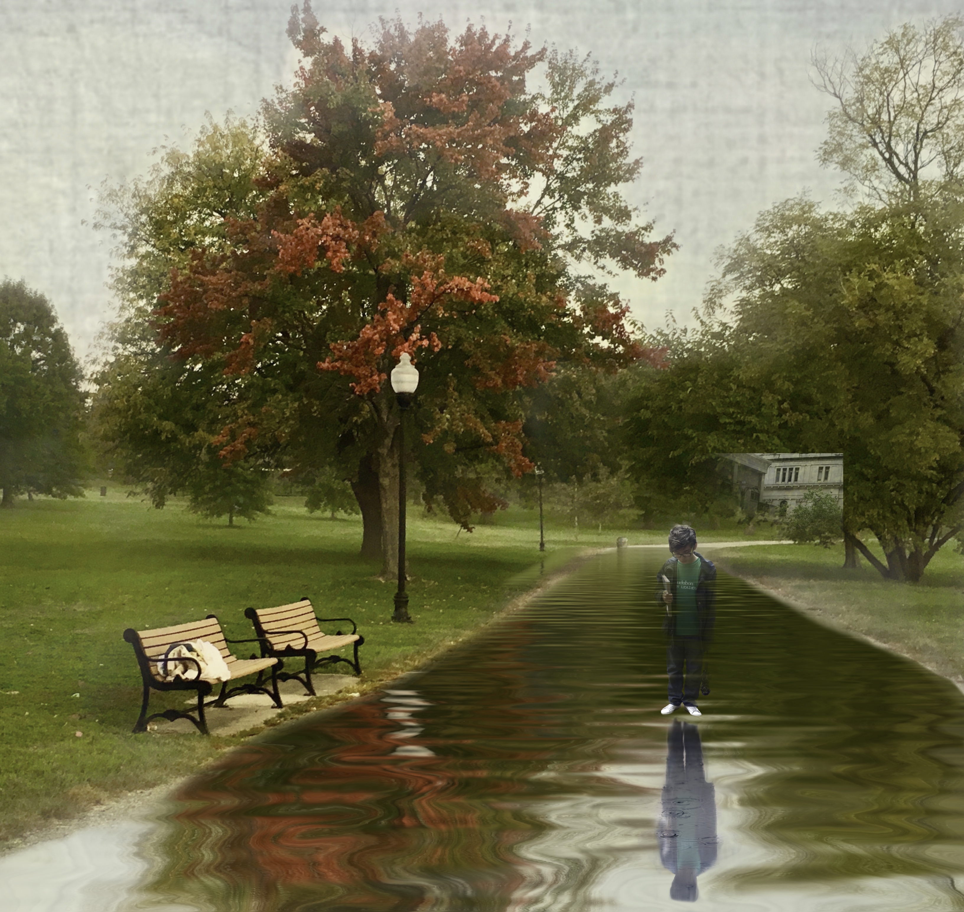 Boy at the park after the rain