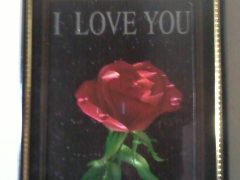 a picture of a rose accompanied by the words "I LOVE YOU"
