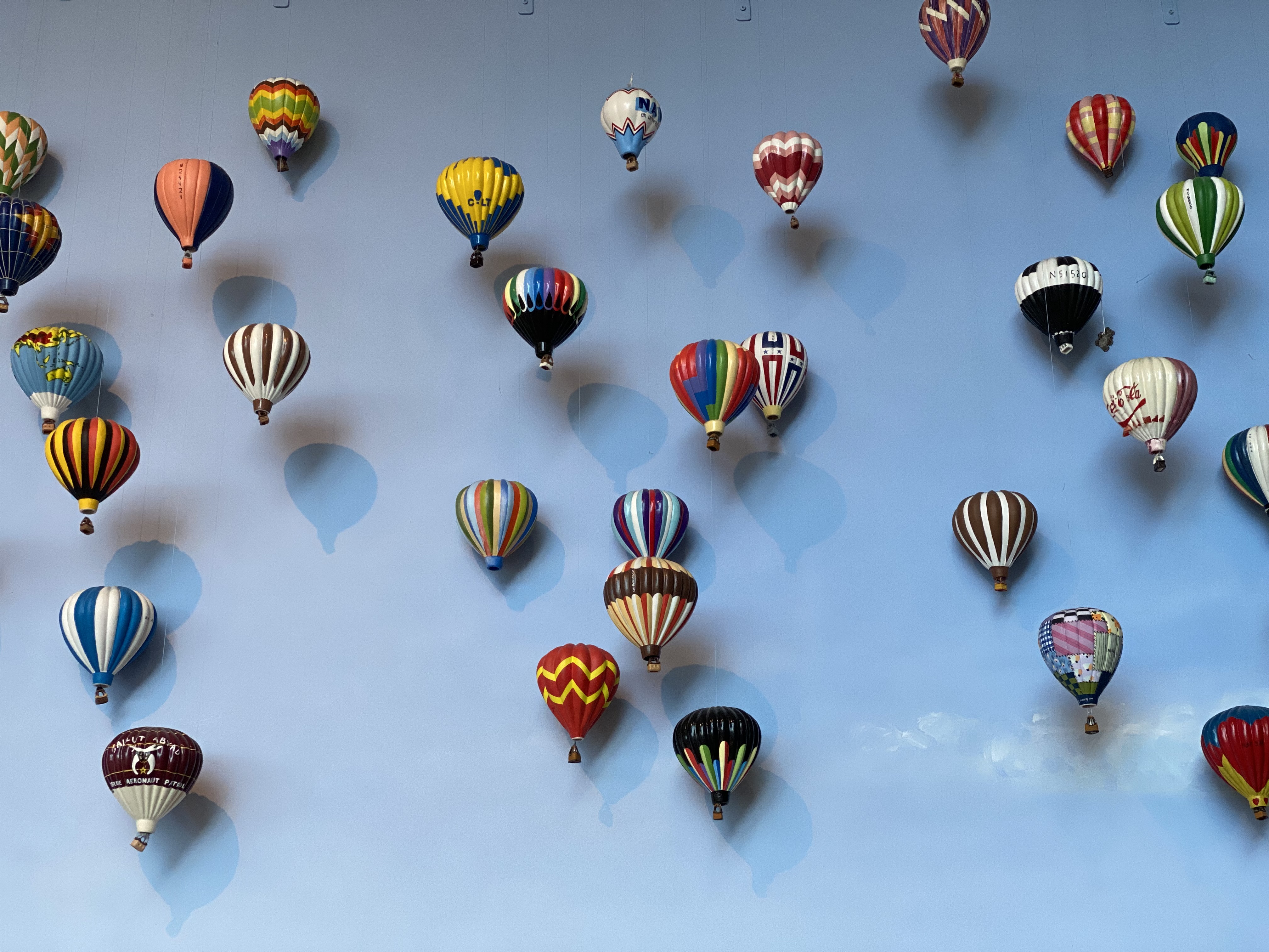 Ballon Fiesta displayed on the wall at the Balloon Museum in Albuquerque