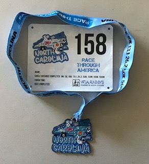 North Carolina medal and bib
