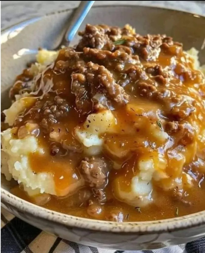 GROUND BEEF AND GRAVY OVER MASHED POTATOES