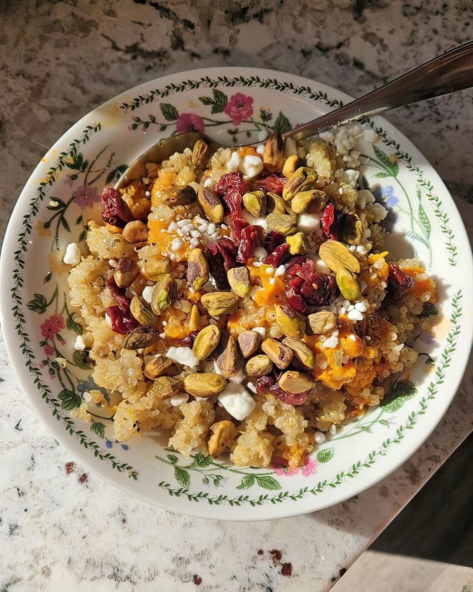 Quinoa Breakfast Bowl with Cottage Cheese, Dried Cranberries & Pistachios