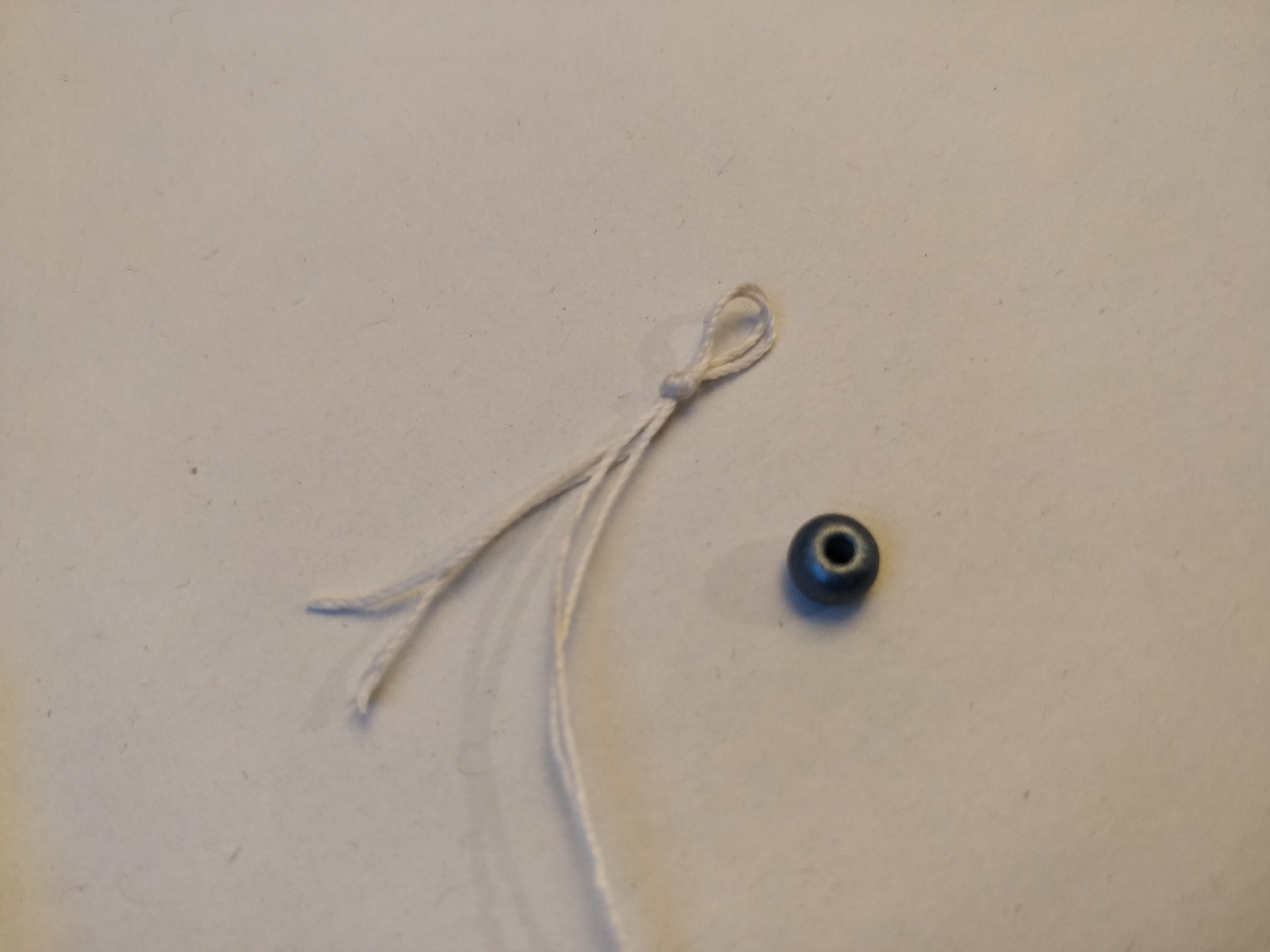 Perlelukning til et armbånd med blomster