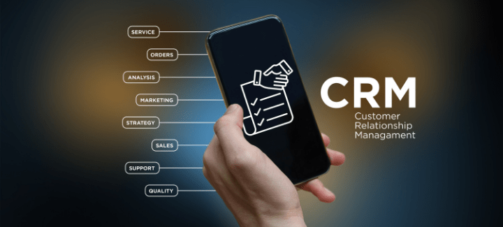 A hand holding a phone, the title CRM next to it, and the words Service, Orders, Analysis, Marketing, Strategy, Sales, Support, and Quality to the left of the phone.