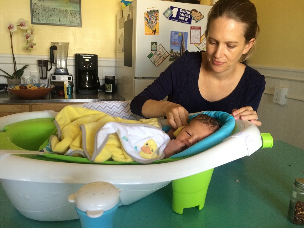Lucia takes her first bath