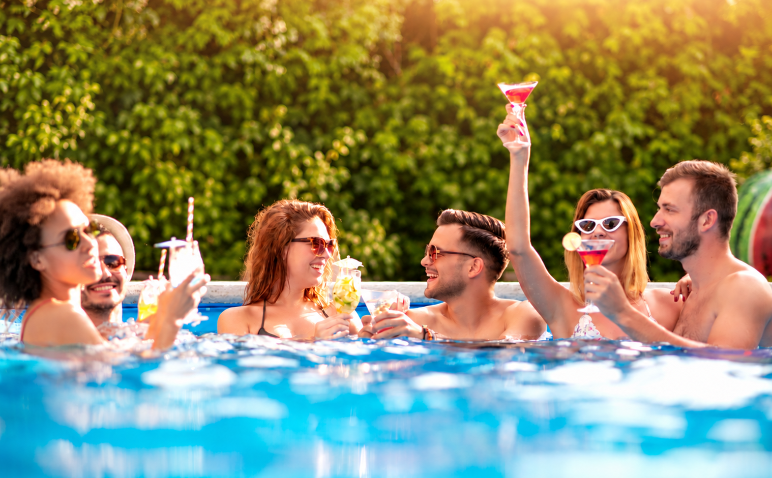 Friends gathering in open pool water