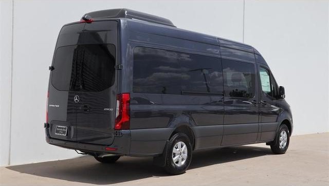 Dark gray Mercedes-Benz Sprinter 2500 high-roof passenger van, rear three-quarter view