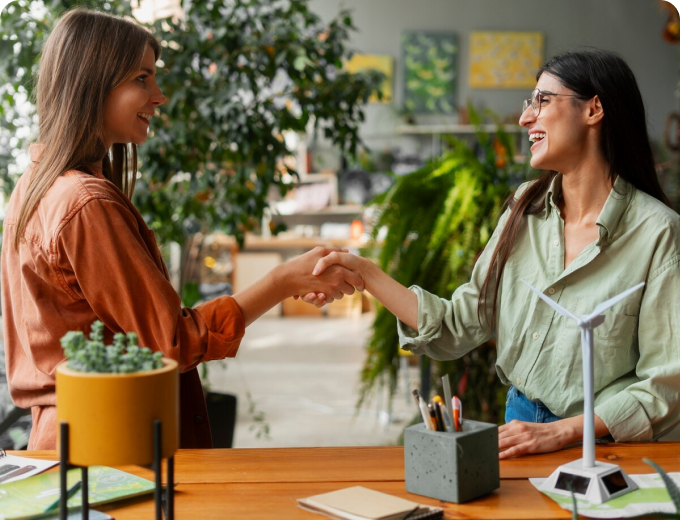 Property owner shaking hands with a property management professional.