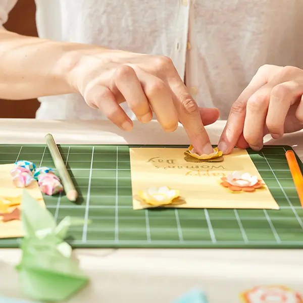 Woman making a handmade card