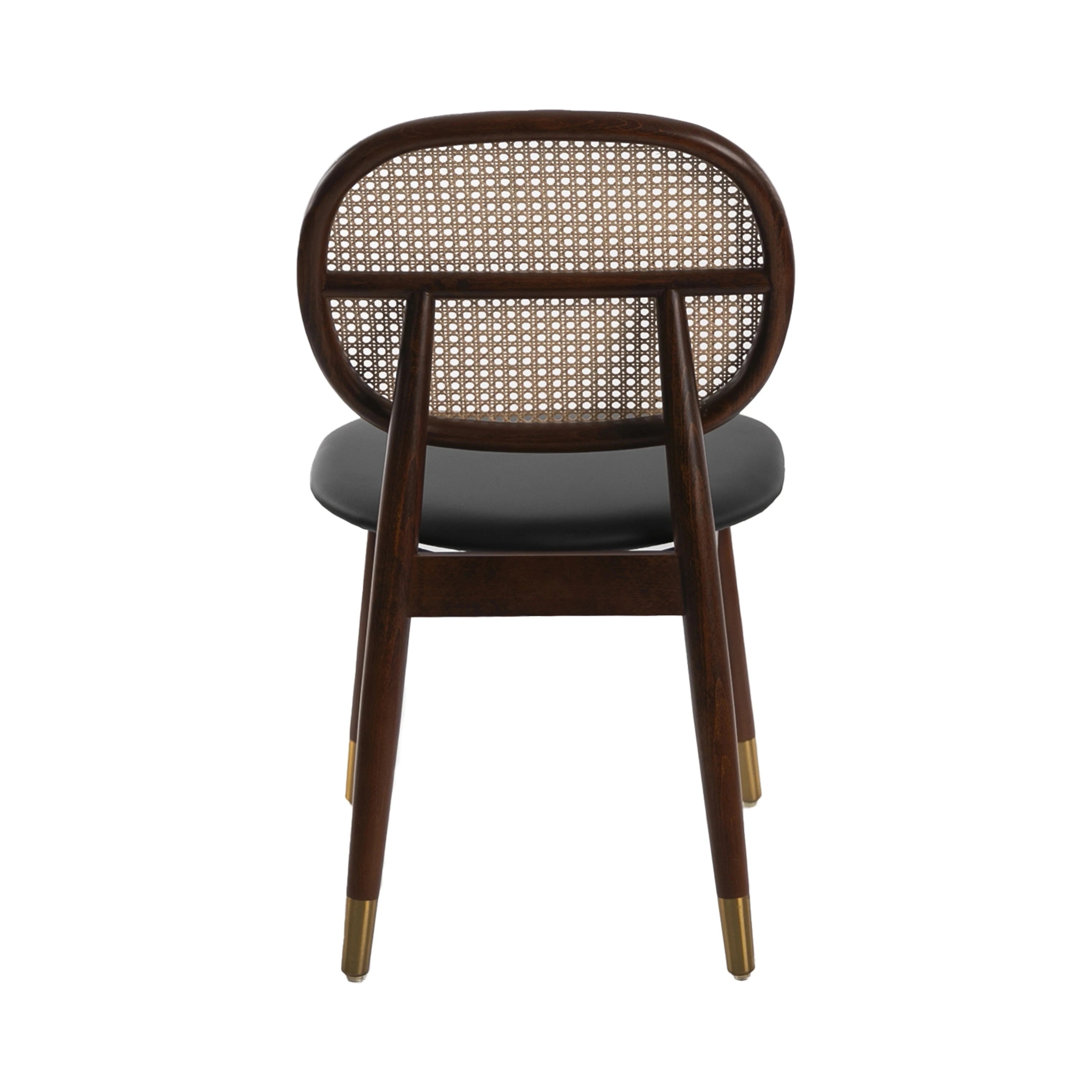 Chaise en rotin et similicuir noir