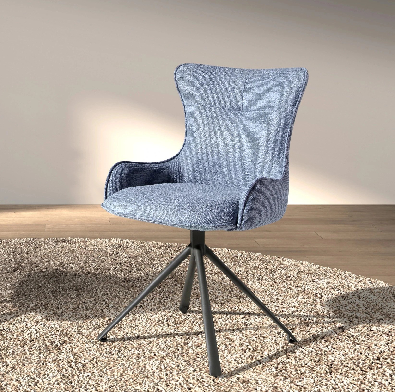 Chaise pivotante en tissu bleu