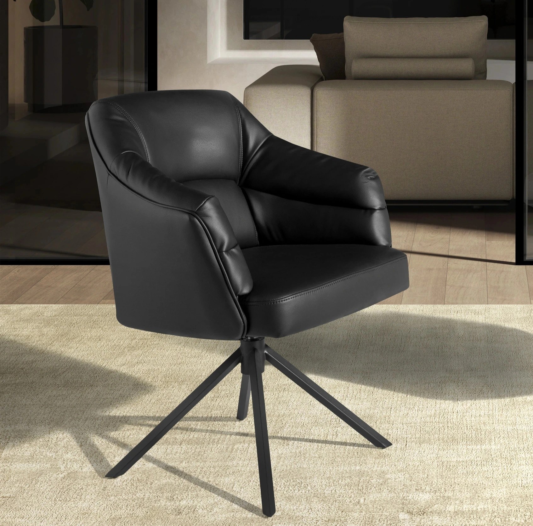 Chaise pivotante en similicuir noir