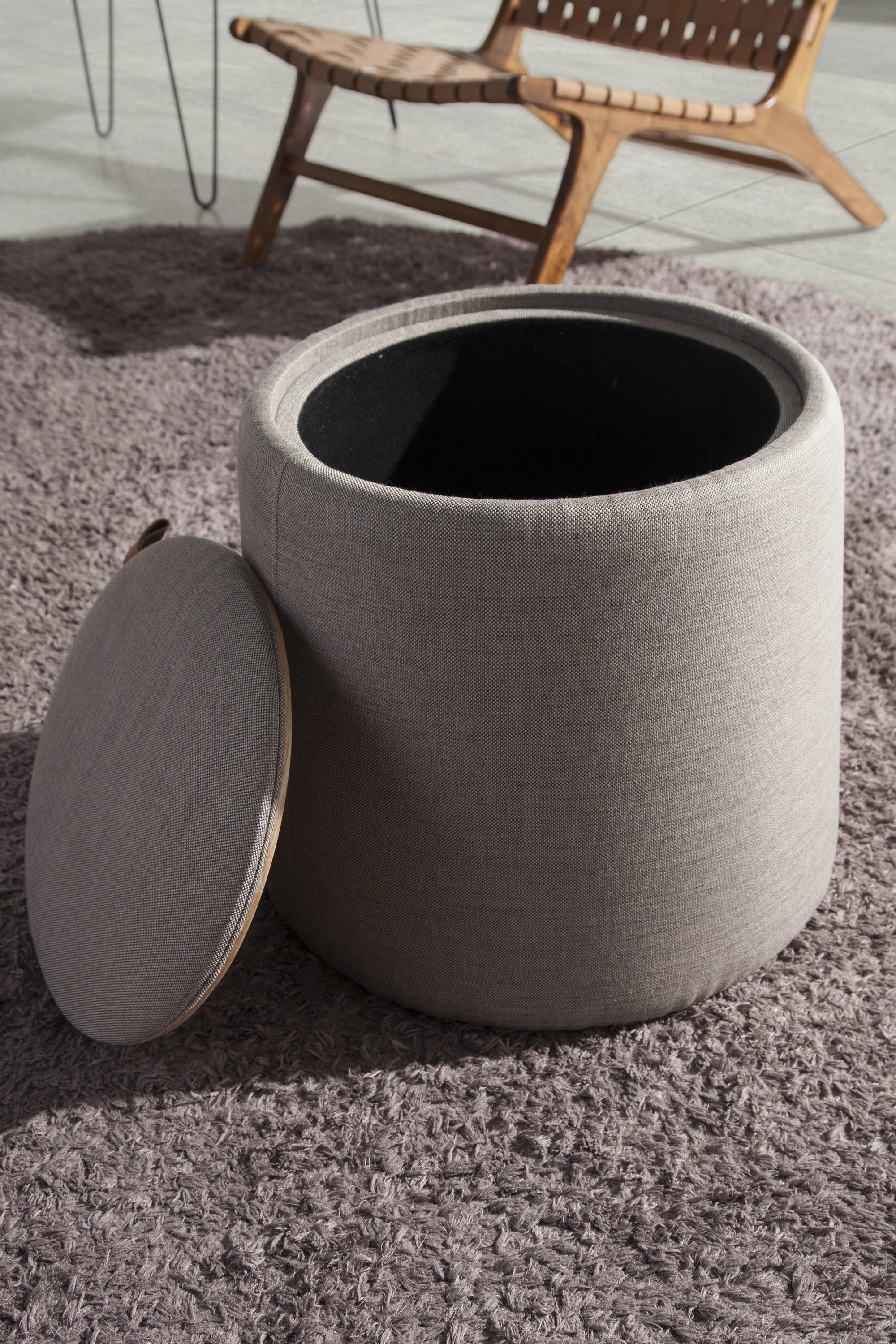 Pouf en tissu gris