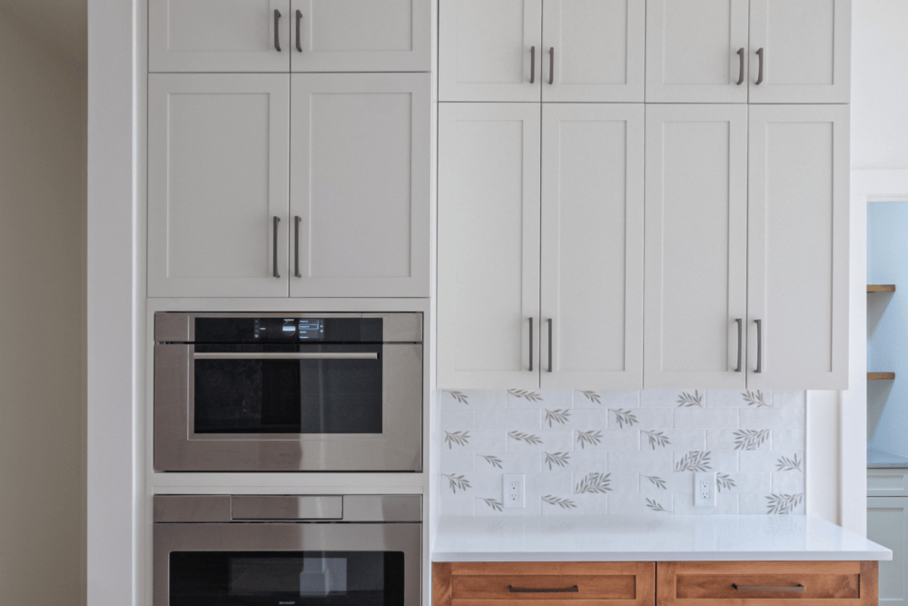 Built in wall ovens and full height cabinetry in a Lexington MA kitchen remodel Built in wall ovens and full height cabinetry in a Lexington MA kitchen remodel