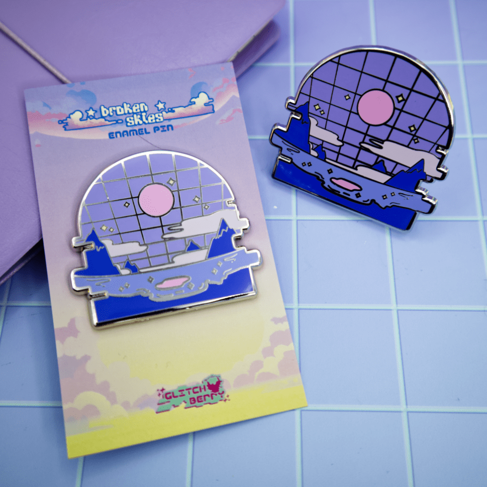 Close-up of Grid Beach hard enamel pin and pin backing card