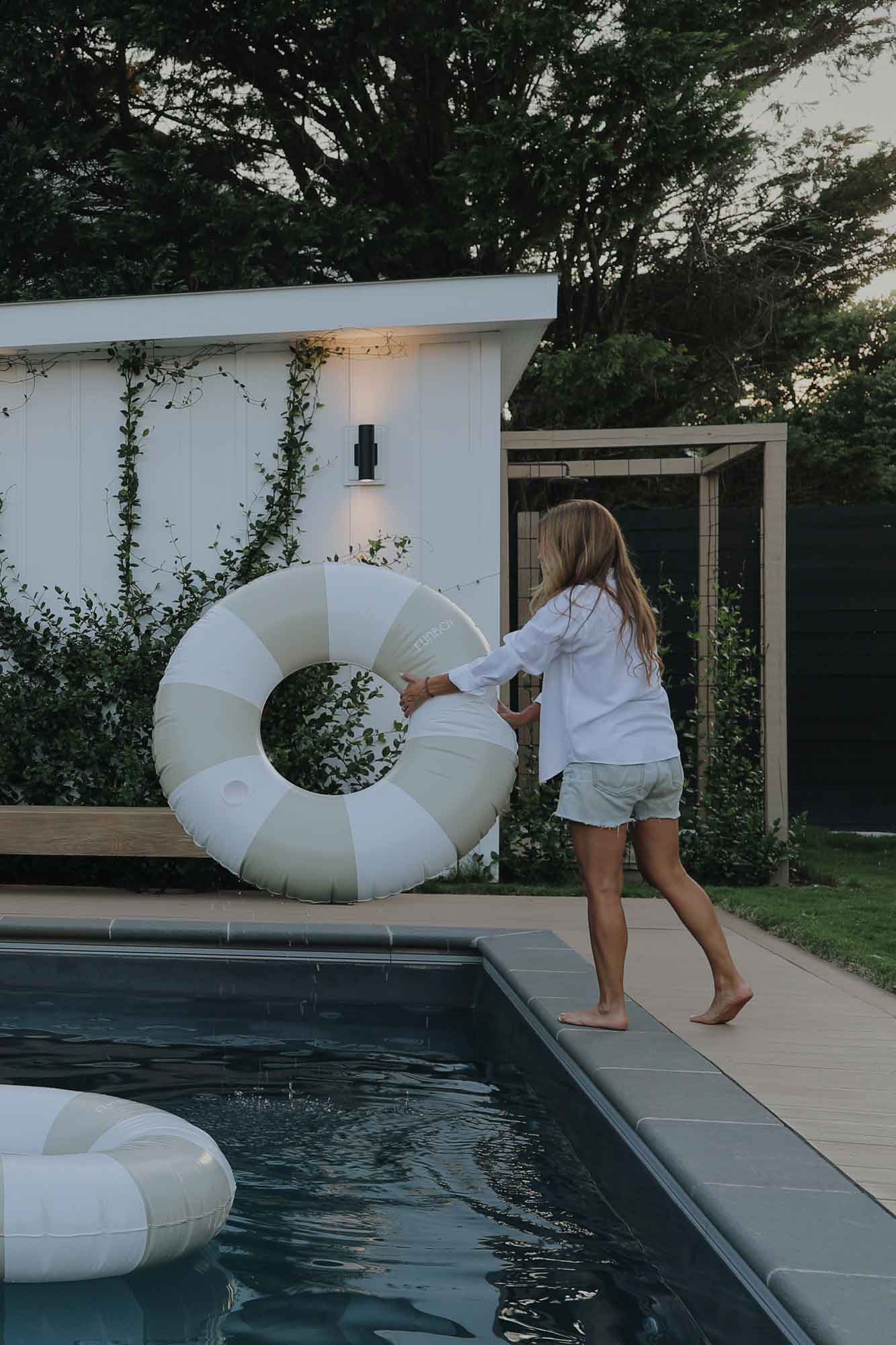 beach outdoor shower design with climbing vines