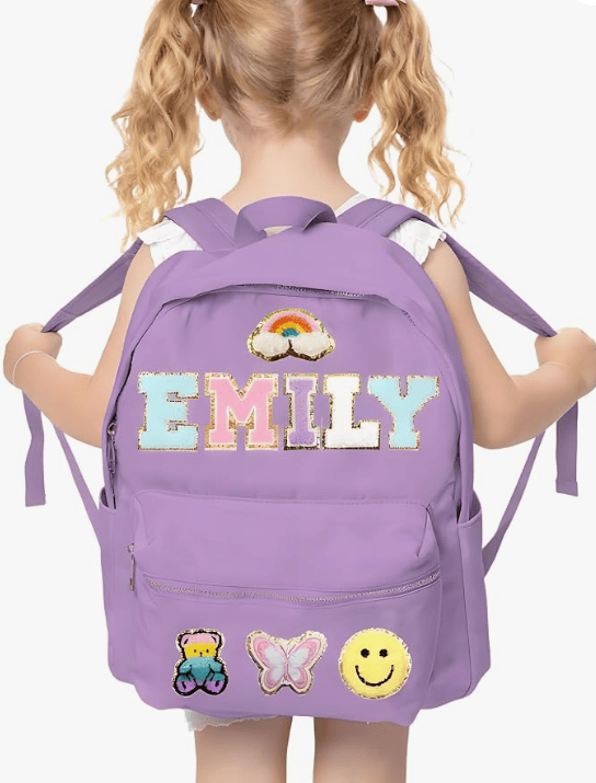 Girl with a personalized purple backpack