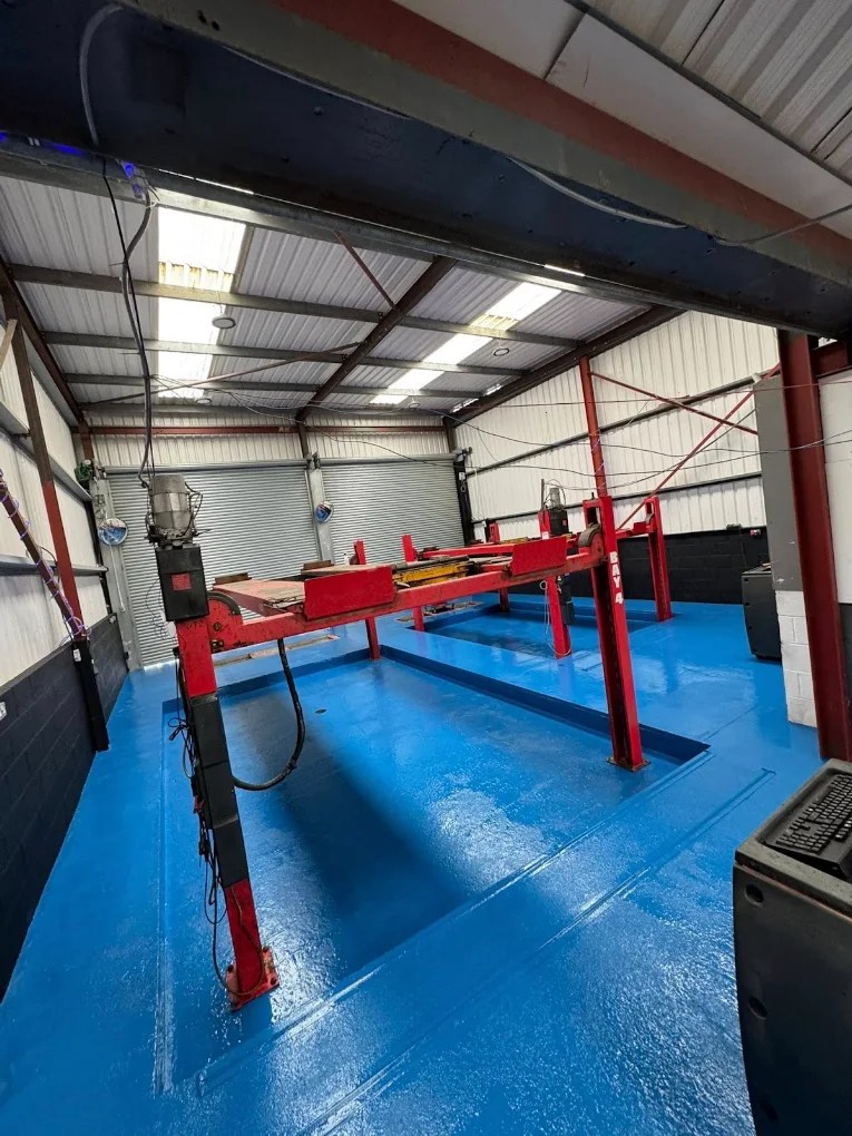 Freshly resurfaced MOT test bay with lift