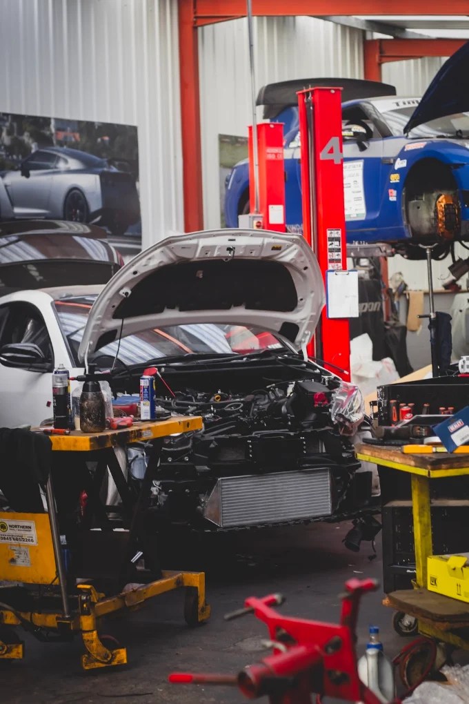 Cars on ramps in the workshop
