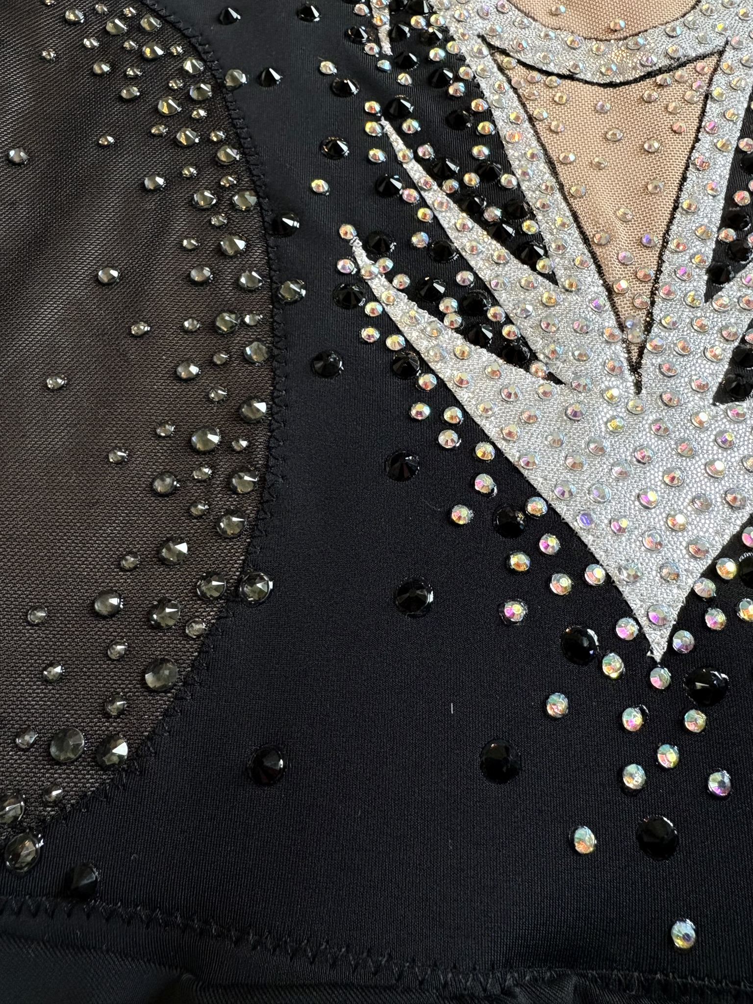 Handmade luxury competition outfit with intricate details for rhythmic gymnastics and acro pairs.