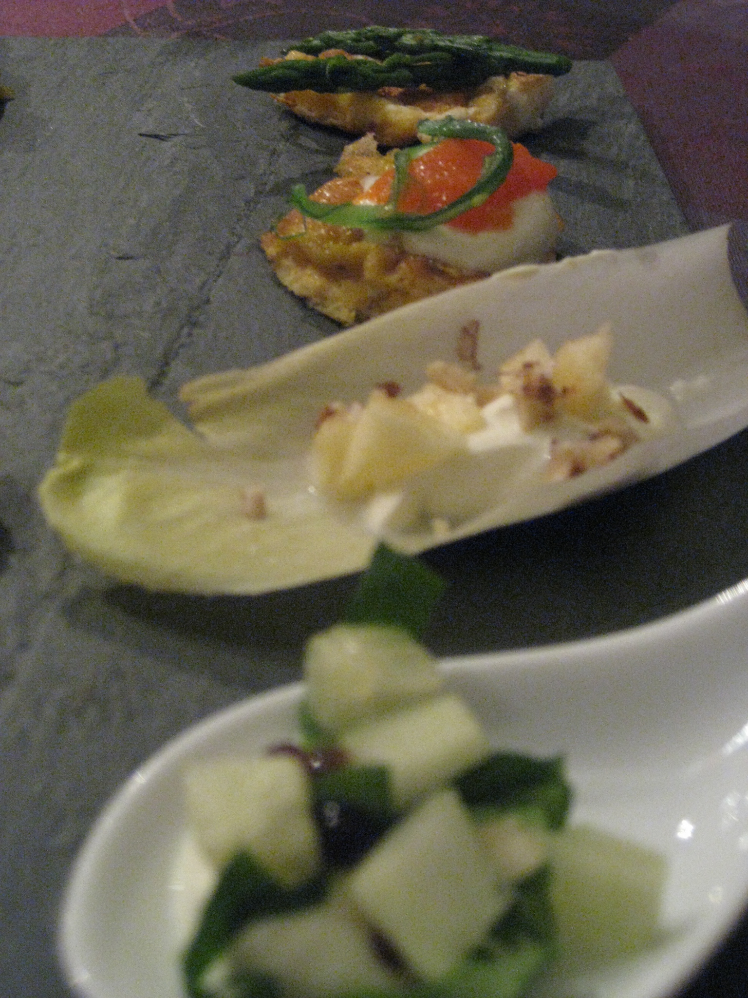 spoon with sour cream, cucumber, lamb's lettuce, and soja pearls. Endive's leaf with sour cream, apple, walnut. Omelette, sour cream, salmon and wakame. Omelette and baby aspargus.