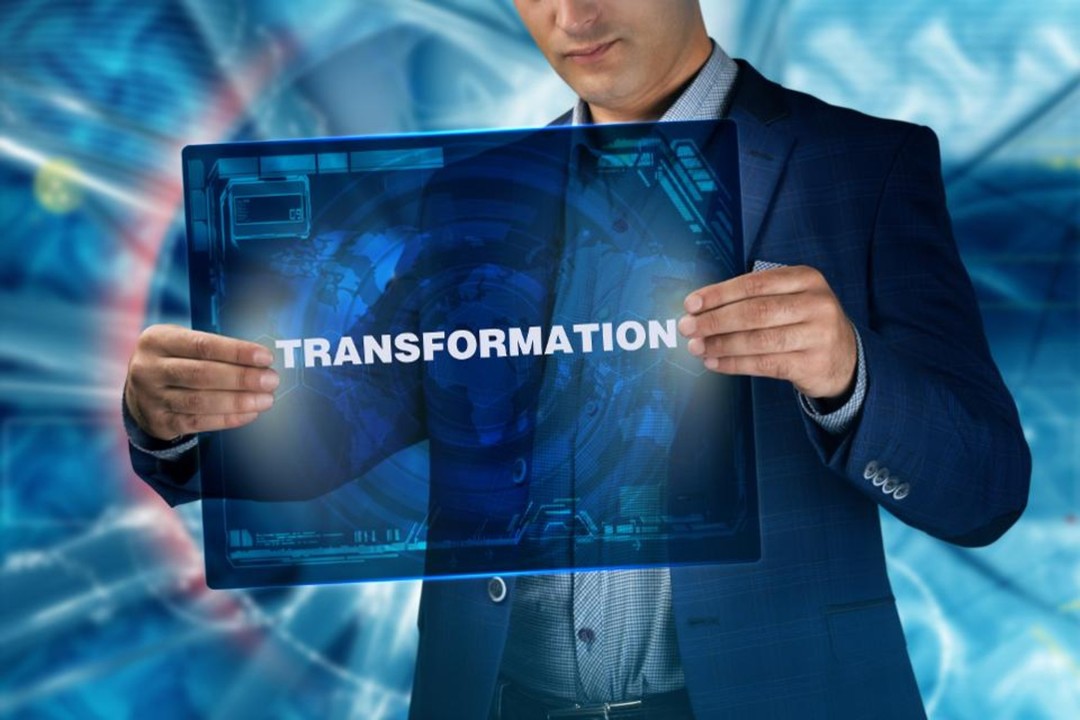 Man holding sci-fi clear sign with the words "transformation"