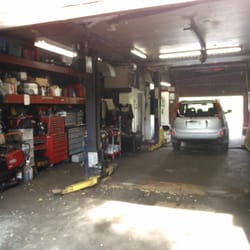 Under the hood engine work at Main Auto Repair
