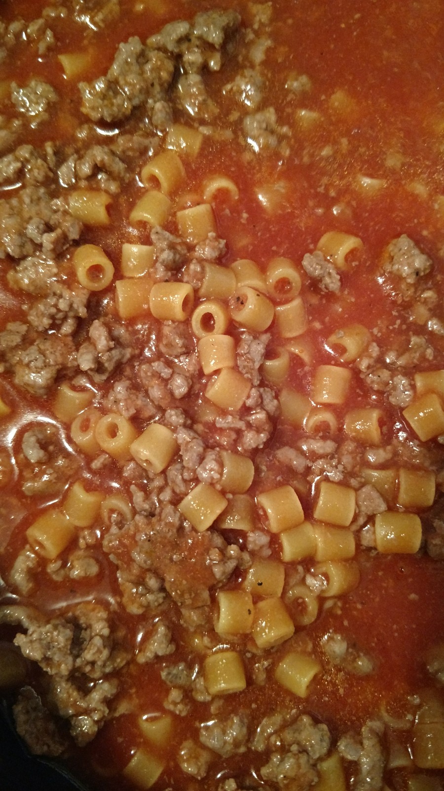 Add pasta, cook until tender.