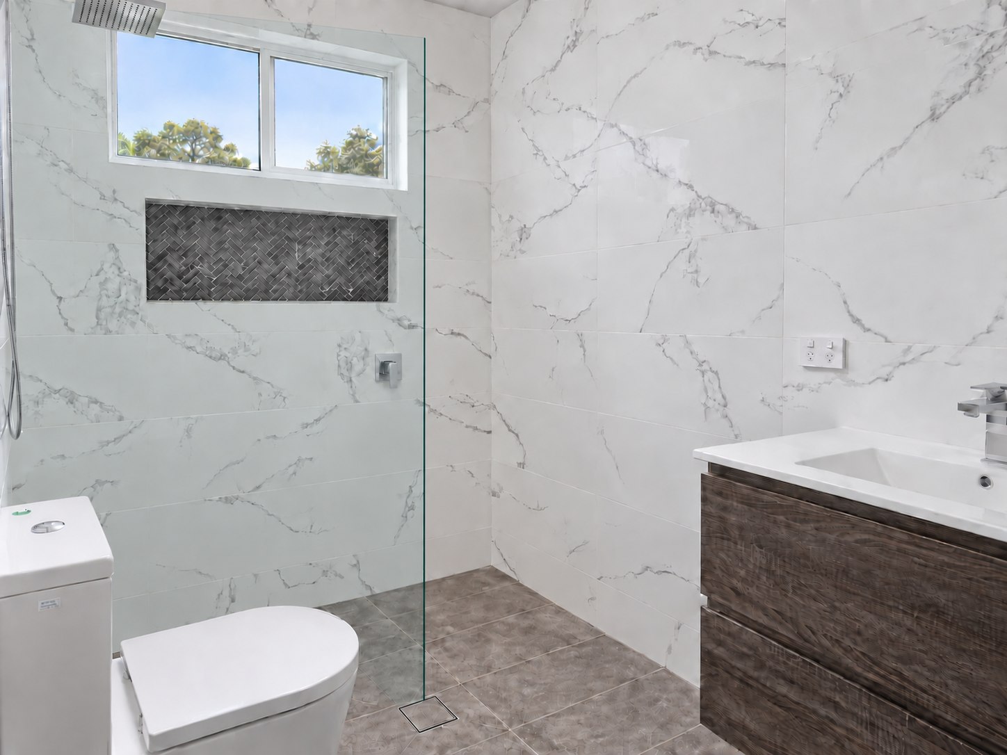 Bathroom renovation with frameless fixed shower screen