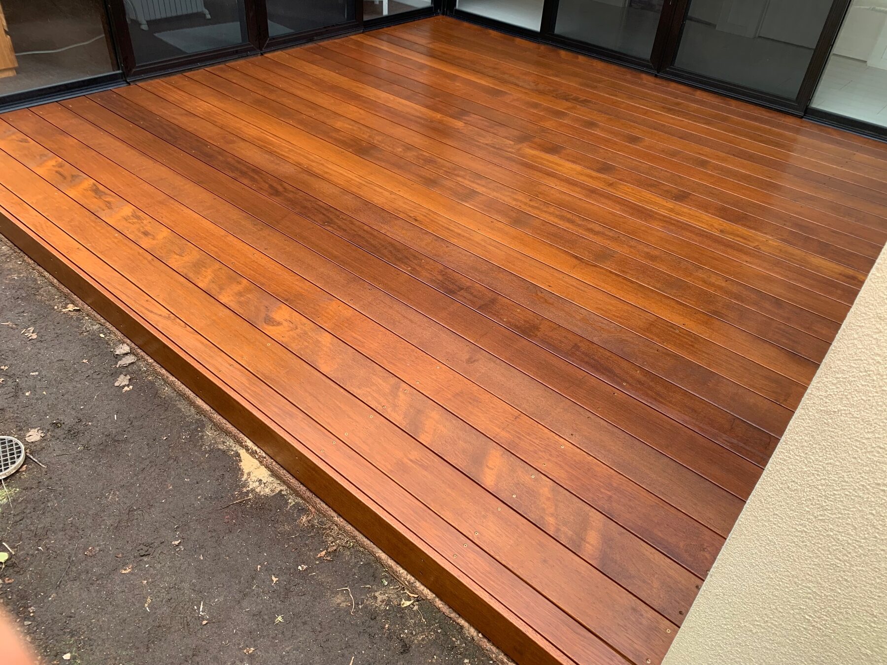 Completed low-level Merbau deck outside sliding doors