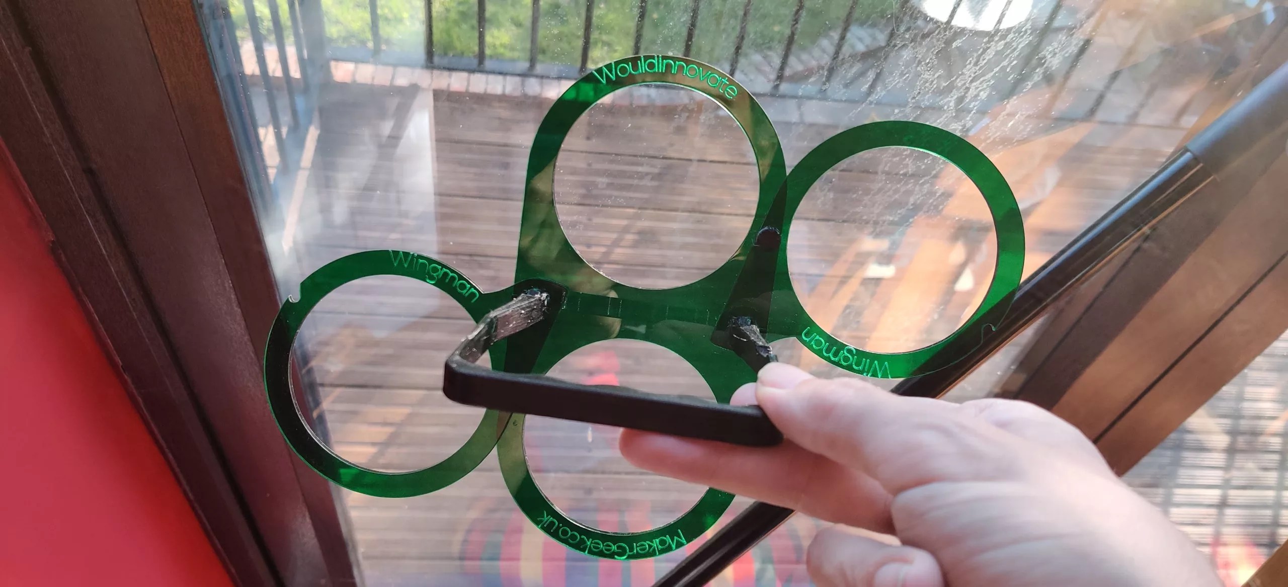 Wingman_translucentGreen_laserEtched Wingman Carrier in translucent green with laser etching visible showing branding